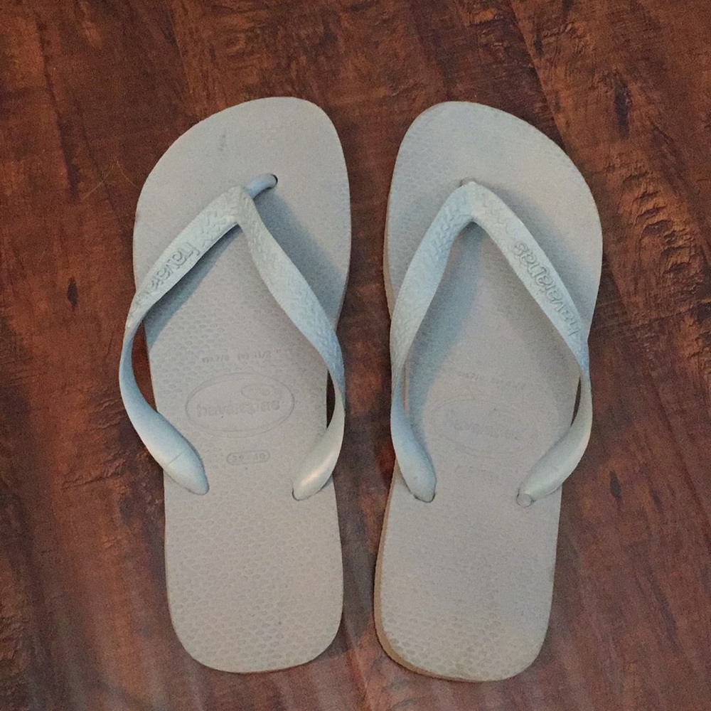 Havaianas light blue flip flops.